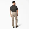 Pantalon de charpentier en toile de coton épaisse à la coupe décontractée Pantalon de charpentier en toile de coton épaisse à la coupe décontractée