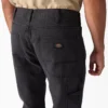 Pantalons de charpentier en toile de coton usée