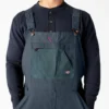 Salopette à double plastron en toile cirée