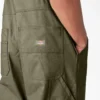Salopette à double plastron en toile cirée