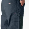 Salopette à double plastron en toile cirée